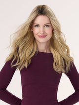 Model is wearing BARELY THERE WAVY 16" in color PROSECCO | BROWN ROOTS WITH GOLDISH BLONDE HIGHLIGHTS