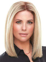 Easily add volume and 12 inches of length at the front and crown with this clip-in topper