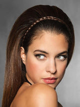 Braided hair on an elastic band so applying is as easy as slipping it on