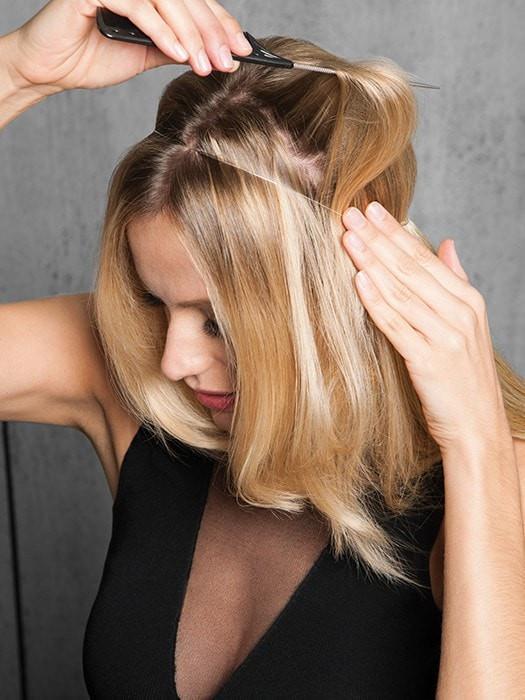 Just slip it on like a headband and pull your own hair over it