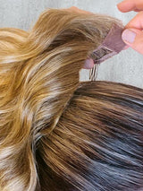 This synthetic ponytail is easy to apply, so you'll be ready for the day or night in a flash!